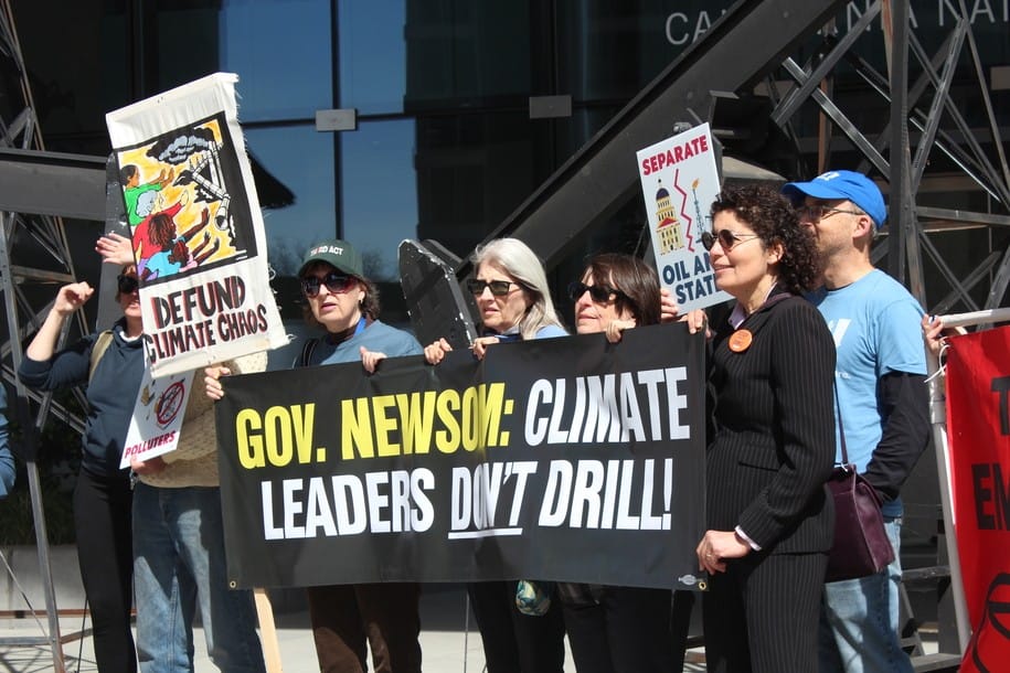 Climate activists protest approval of hundreds of neighborhood oil drilling permits this year in CA