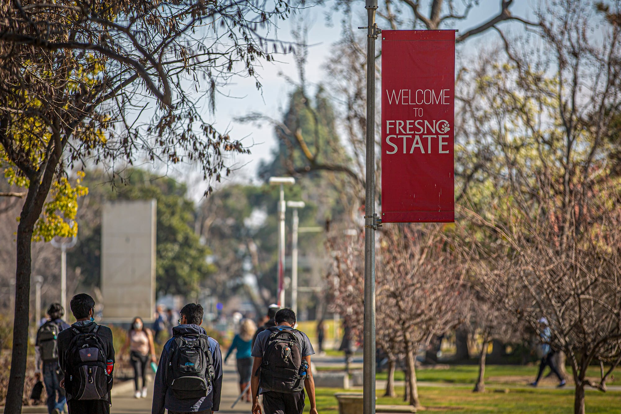 Students walk through the Fresno State campus in Fresno, on Feb. 9, 2022. Photo by Larry Valenzuela for CalMatters