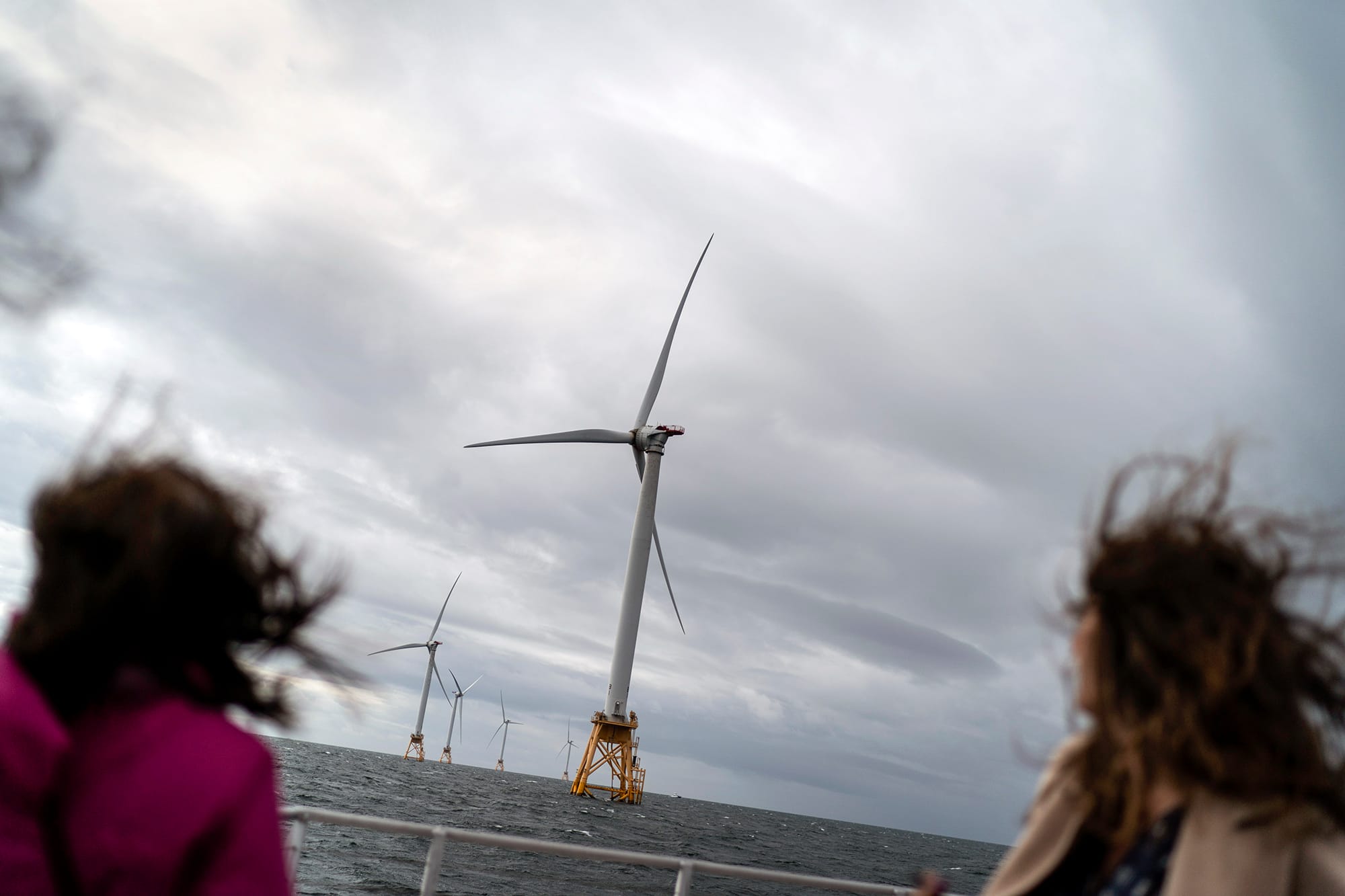 Turbines of America's first offshore wind farm, owned by the Danish company, Orsted, off the coast of Block Island, R.I. on Oct. 17, 2022. Hundreds of offshore wind developers and experts gathered in Rhode Island to talk about the future of clean energy— how to grow the offshore wind industry and address shared challenges. Photo by David Goldman, AP Photo