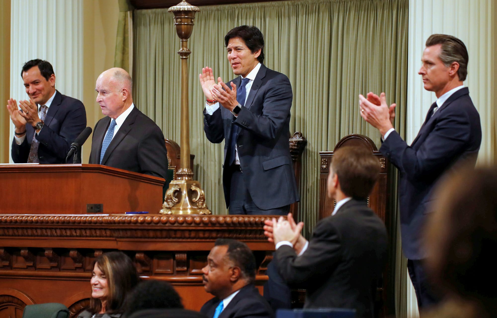 Then California Senate President pro Tempore Kevin de Leon (center) and others applaud as then California Governor Brown delivers his final state of the state address in Sacramento on Jan. 25, 2018. Photo by Fred Greaves, Reuters