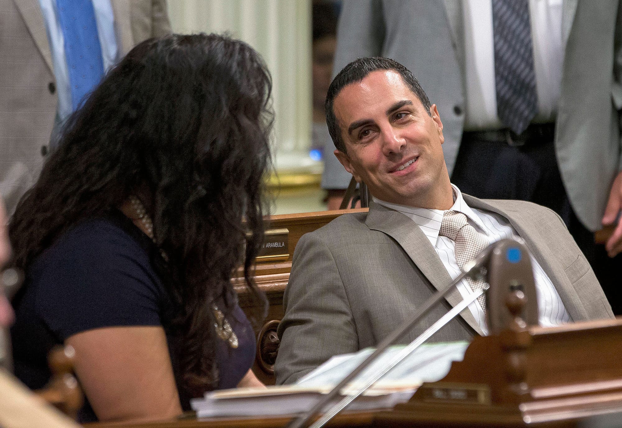 Assemblyman Mike Gatto talks with Assemblywoman Lorena Gonzalez during the Assembly session on Aug. 30, 2016 in the state capitol in Sacramento. Photo by Rich Pedroncelli, AP Photo